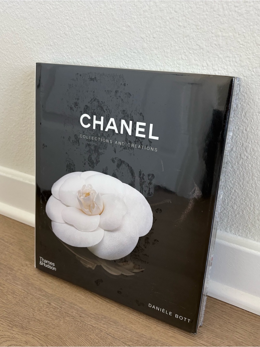 CHANEL Black Hardcover Coffee Table Book with White Camellia